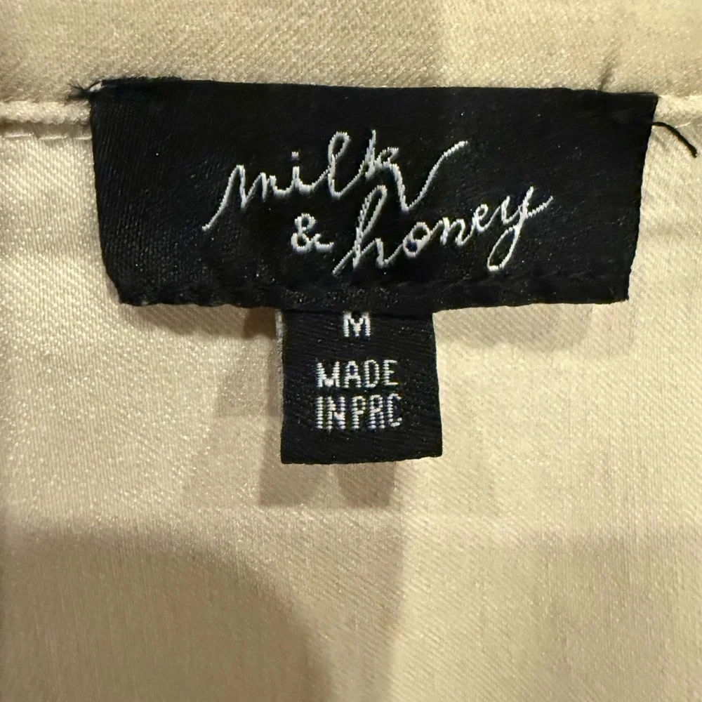 Chic Cream Sleeveless Wrap Dress - Picture 5 of 10